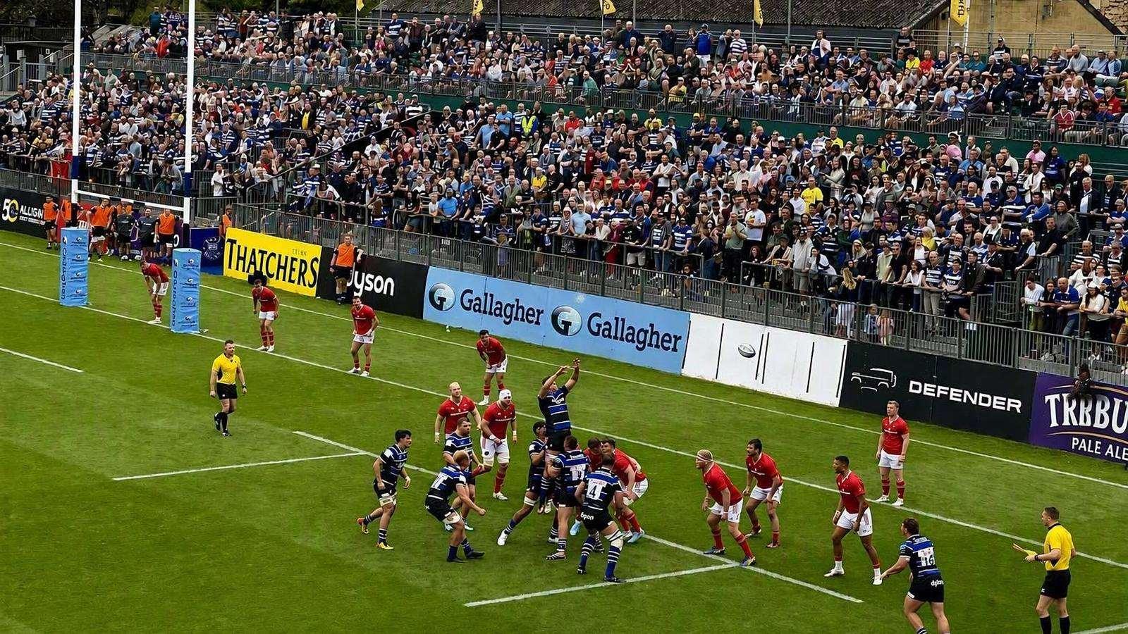 A rugby lineout in a packed stadium