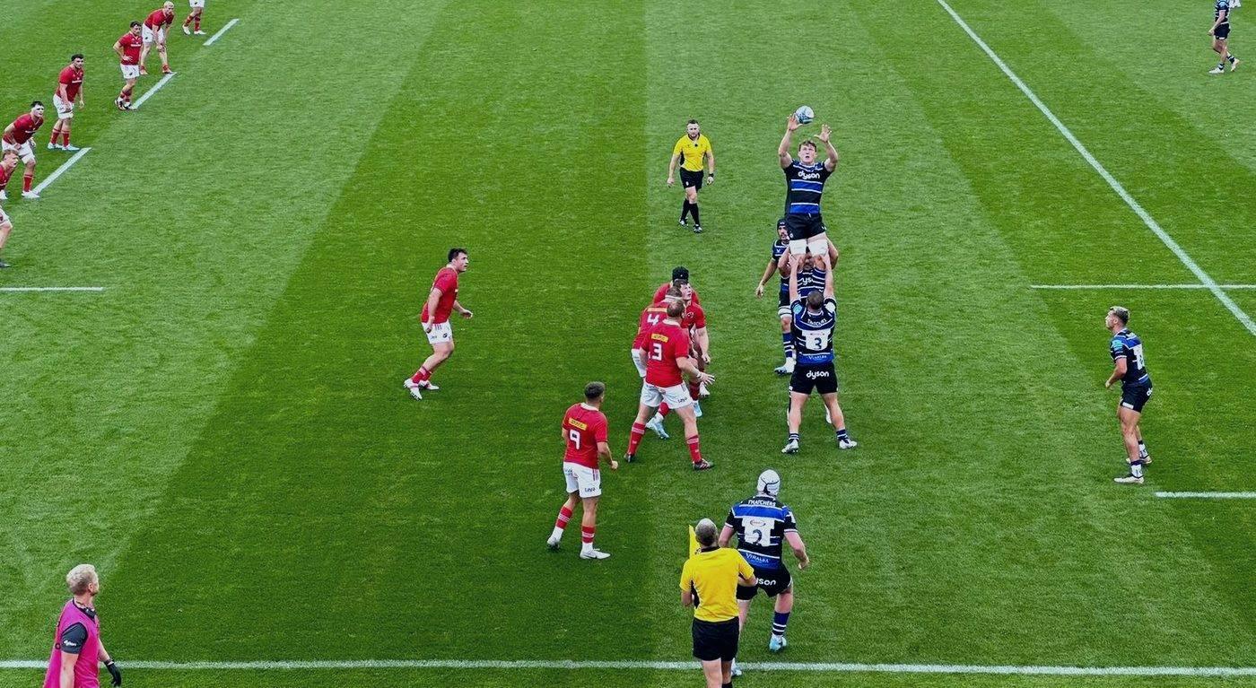 A rugby lineout in a packed stadium