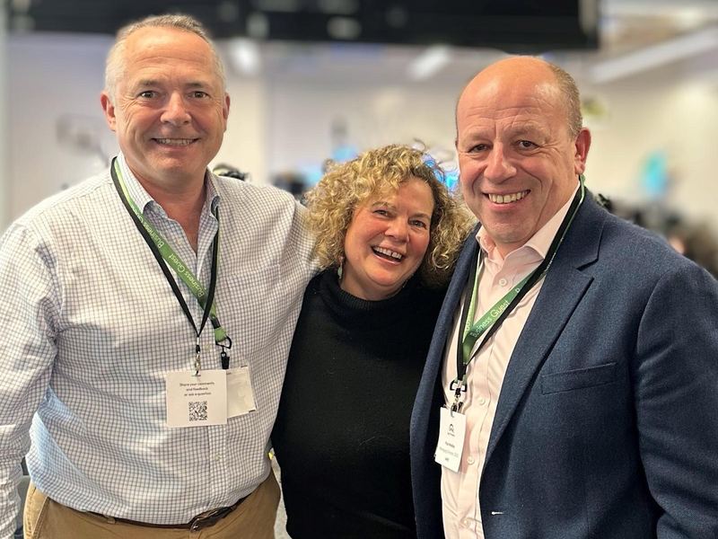 Simon Long with two colleagues at an employer event